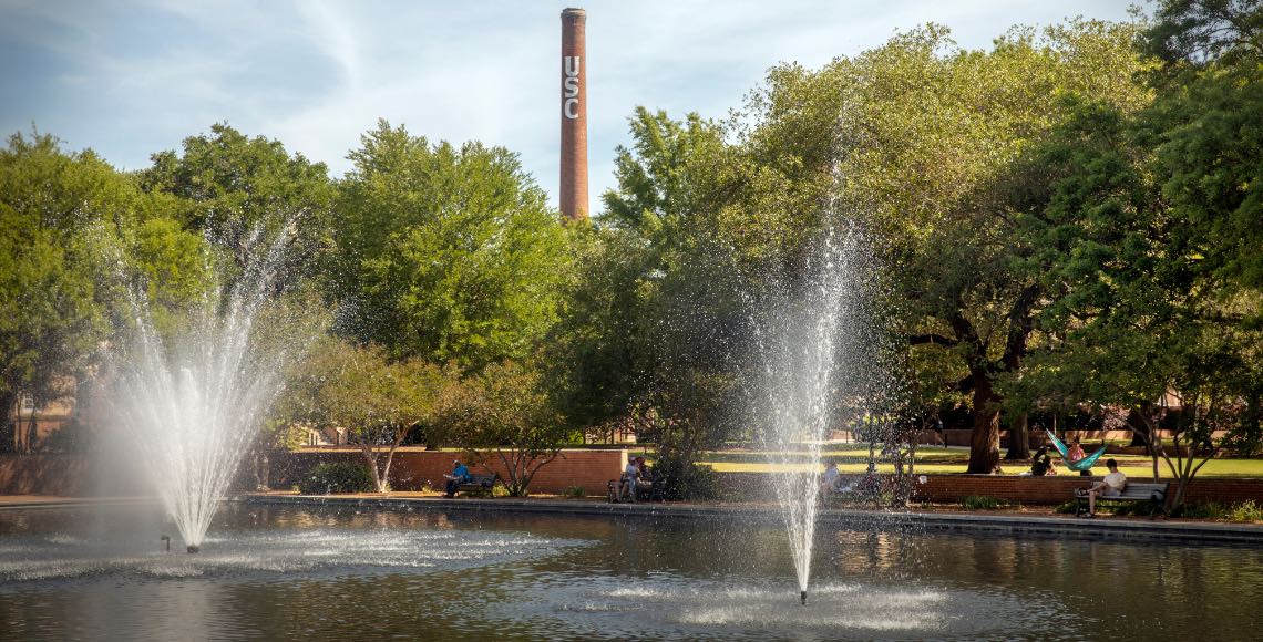 Fountains inside the library pond on the USC main campus.