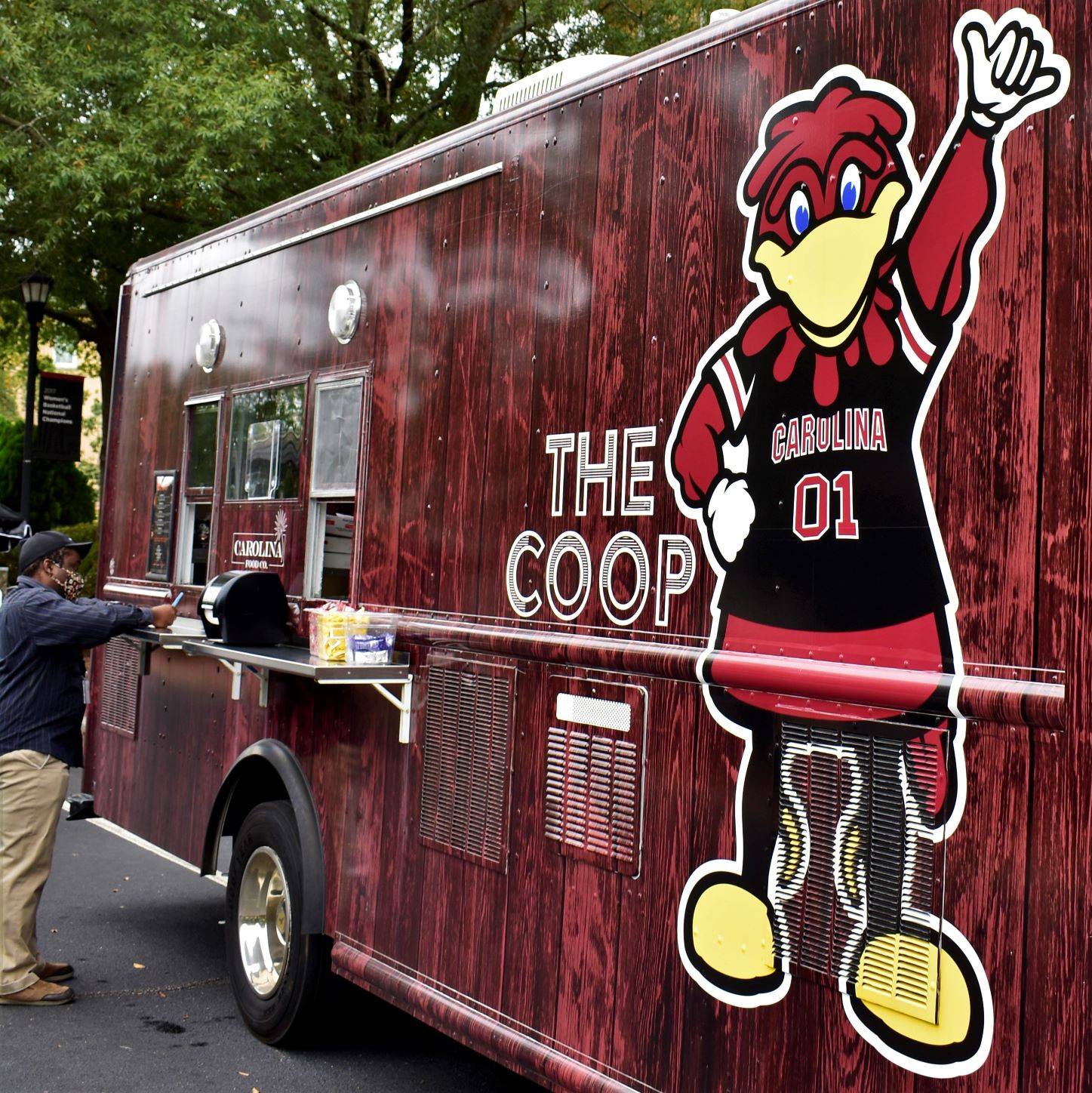 Student waiting at food truck