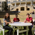 Three students outside of Green Quad