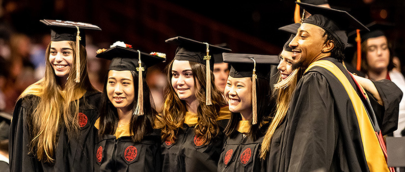 decorated mortar board at commencement ceremony