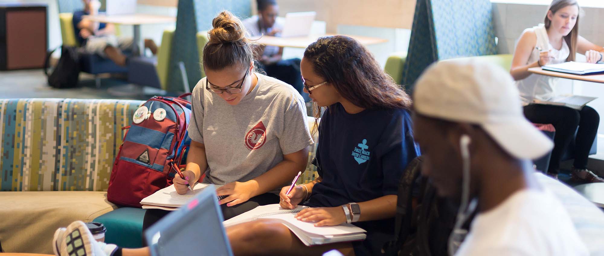 Students gather to study together in the Russell House third floor lounge.