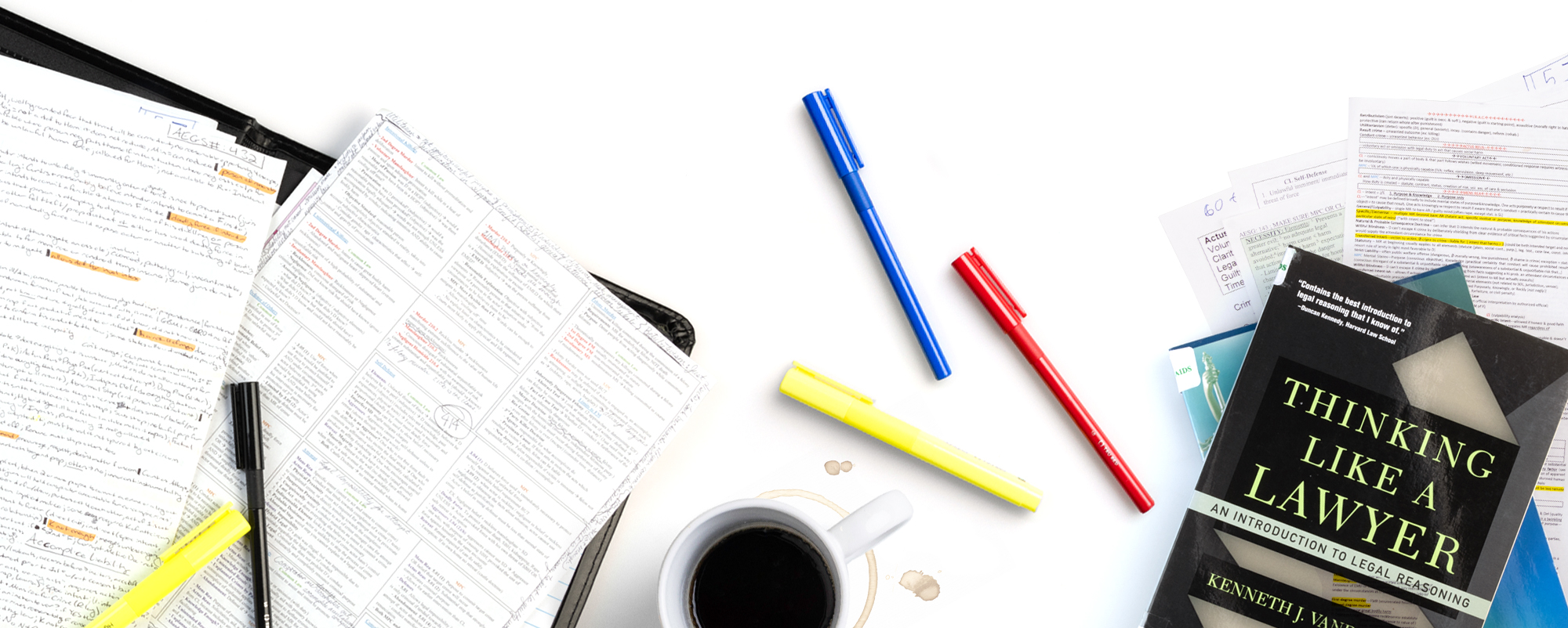 Various items representing the School of Law on a white background.