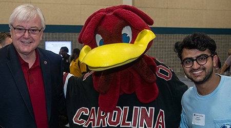 President Amiridis, Cocky and a student at imagine Carolina