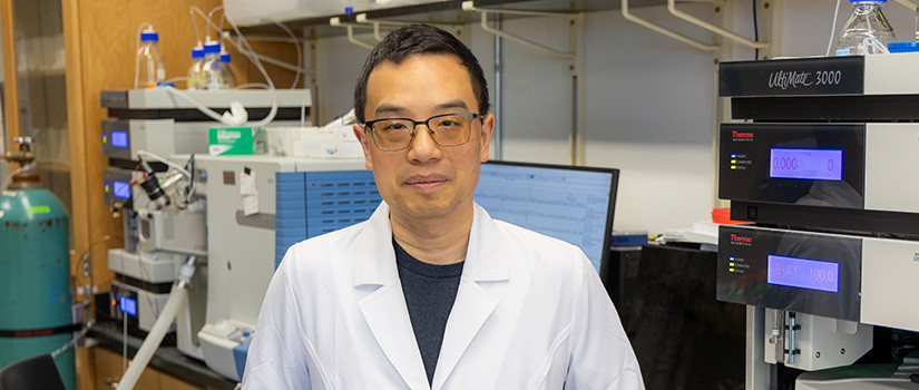 man with a lab coat on in a lab