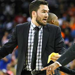 Andrew Glover at a game during a coaching moment