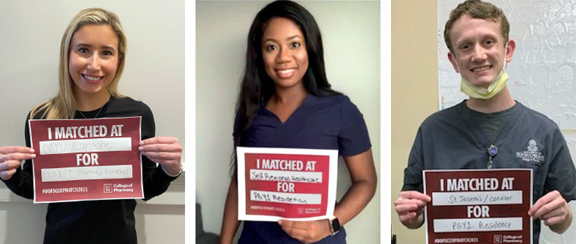 Students holding match day signs