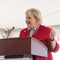 USC Nursing Dean Jeannette Andrews stands at podium